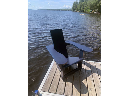 Westport Chair on the dock of a bay in Maine